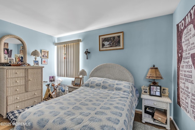 bedroom featuring hardwood / wood-style floors