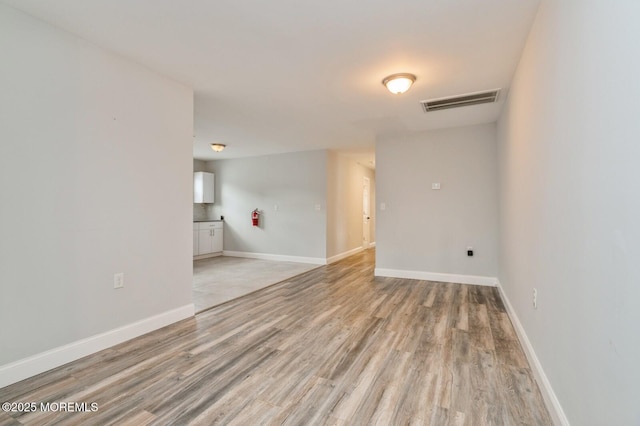 empty room featuring light hardwood / wood-style floors