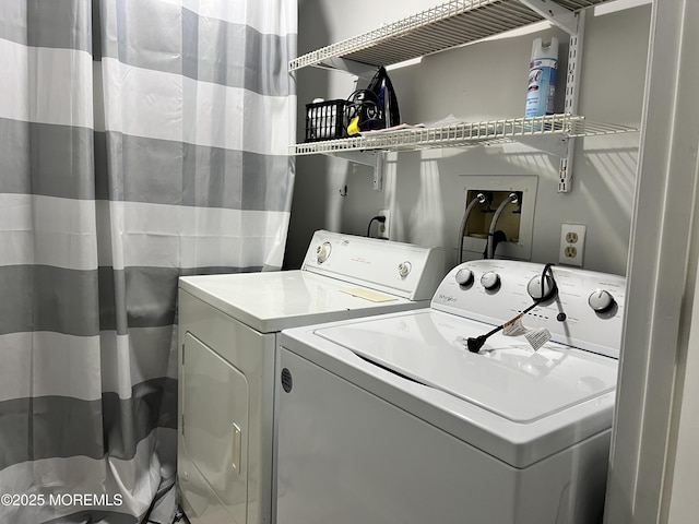 laundry area with separate washer and dryer