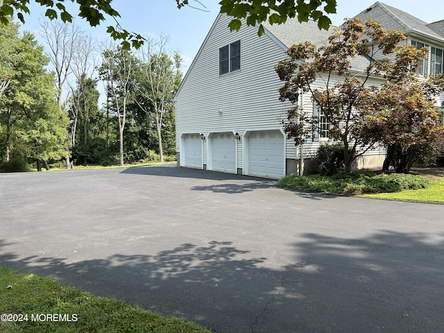 view of home's exterior featuring a garage