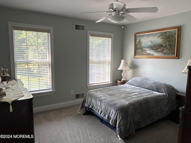 carpeted bedroom with ceiling fan