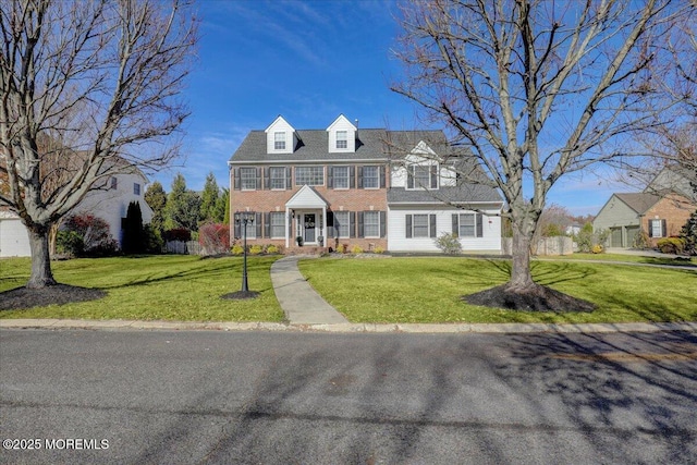 view of front of home featuring a front lawn