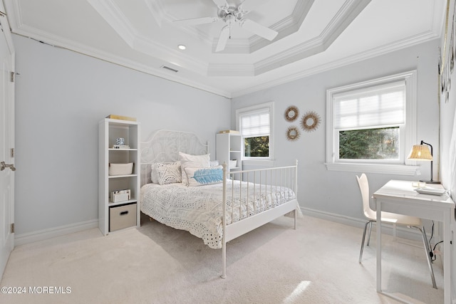 carpeted bedroom featuring ceiling fan and crown molding