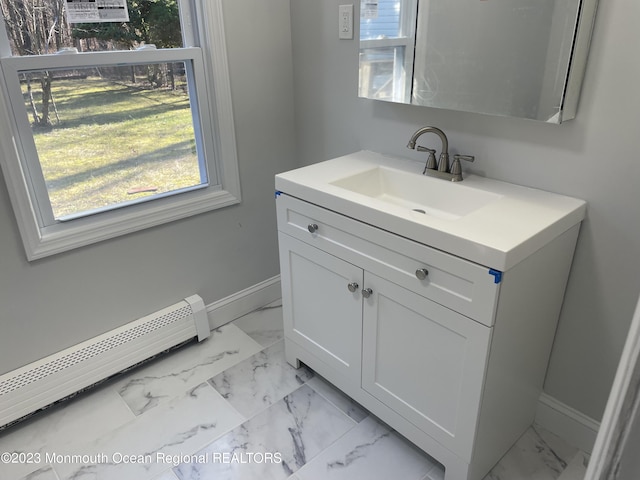 bathroom featuring vanity and a baseboard radiator