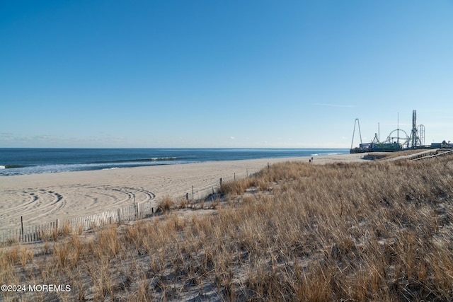 view of water feature featuring a beach view