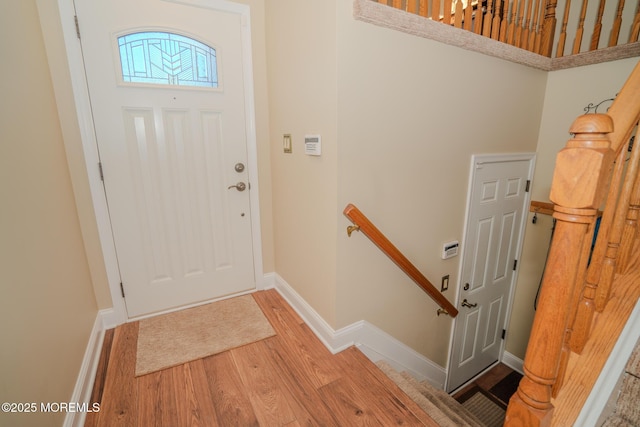 entrance foyer featuring hardwood / wood-style floors