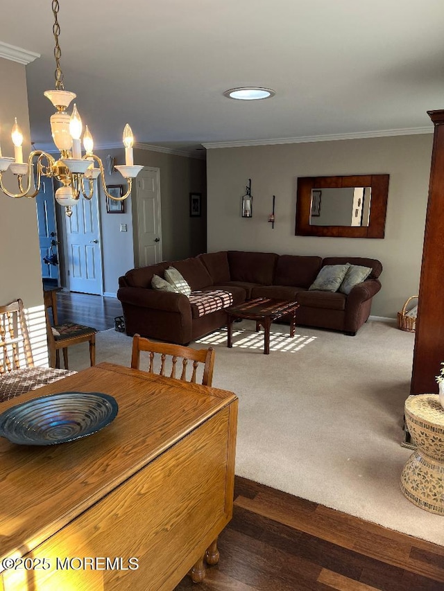 dining room with a chandelier and ornamental molding