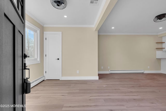 interior space with baseboard heating, crown molding, and light hardwood / wood-style flooring