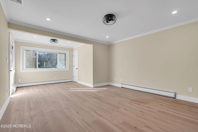 unfurnished room with ornamental molding, a baseboard radiator, and light hardwood / wood-style flooring