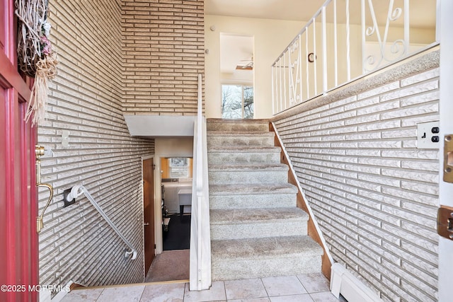 stairs with tile patterned floors