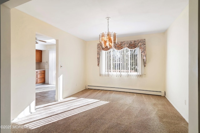 carpeted spare room with an inviting chandelier and a baseboard heating unit