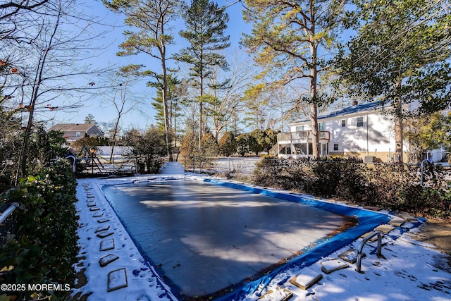 view of yard covered in snow