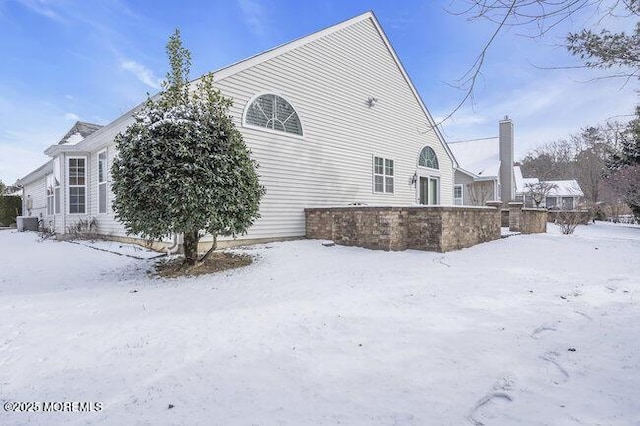 view of snow covered property