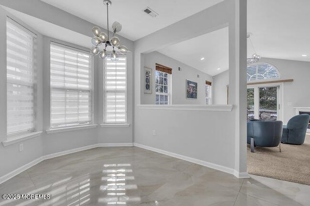 unfurnished dining area featuring a chandelier