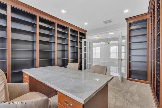 office area with french doors and light colored carpet