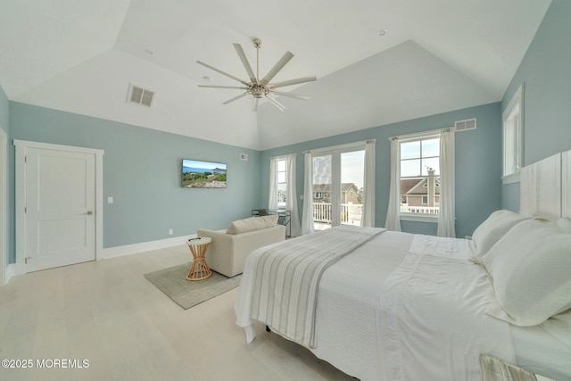 bedroom featuring access to exterior, ceiling fan, light hardwood / wood-style floors, and vaulted ceiling