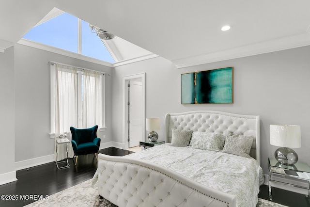 bedroom featuring ornamental molding, dark hardwood / wood-style flooring, and lofted ceiling