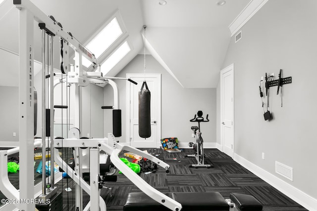 workout room with lofted ceiling