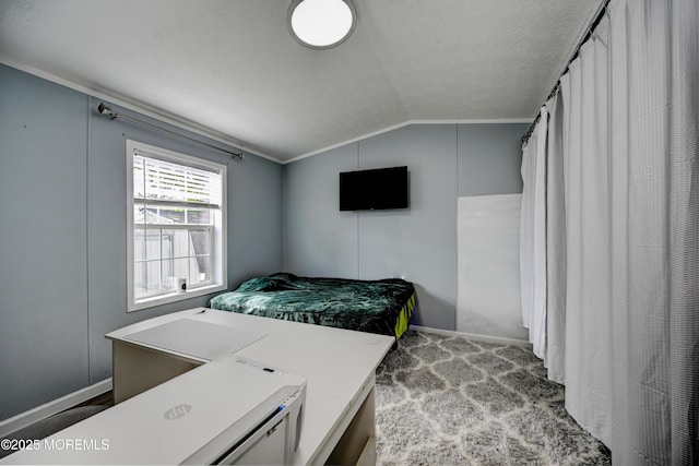 bedroom with crown molding and vaulted ceiling