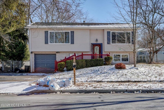 bi-level home featuring a garage