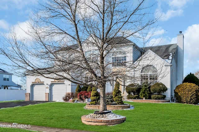 view of front of home with a front lawn