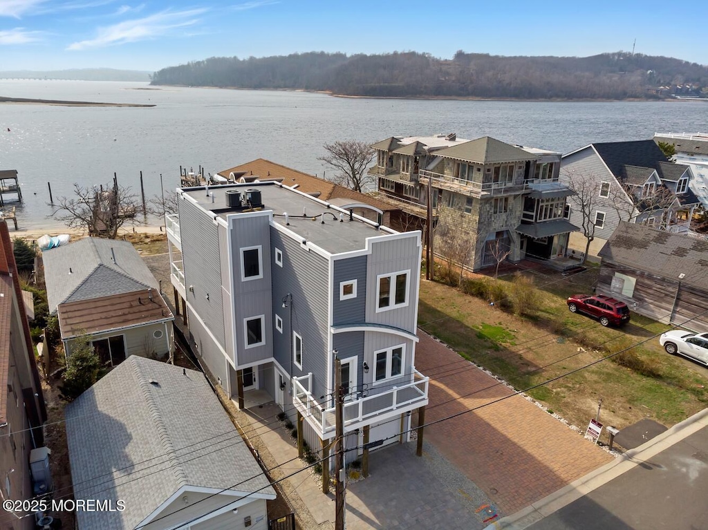 bird's eye view with a water view