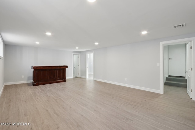 empty room with light wood-type flooring