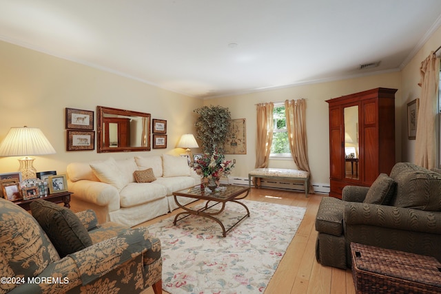 living room featuring light wood-type flooring, crown molding, and a baseboard heating unit