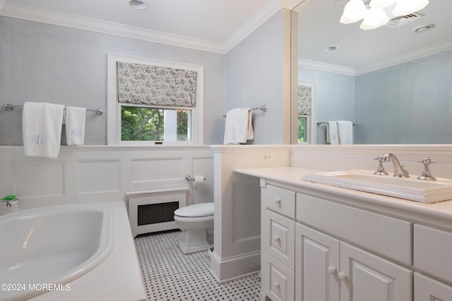 bathroom with crown molding, a bathtub, vanity, and toilet