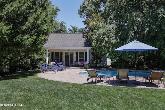 exterior space featuring ceiling fan, a yard, and a patio