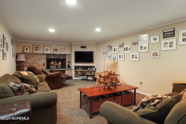 carpeted living room with a stone fireplace and ornamental molding