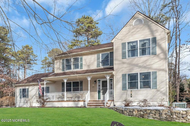 view of front of house featuring a porch and a front yard