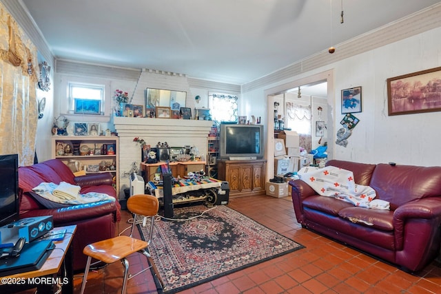 living room with tile patterned floors, crown molding, and plenty of natural light