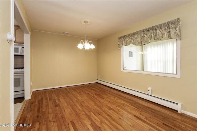 unfurnished dining area featuring hardwood / wood-style flooring, a notable chandelier, and a baseboard radiator