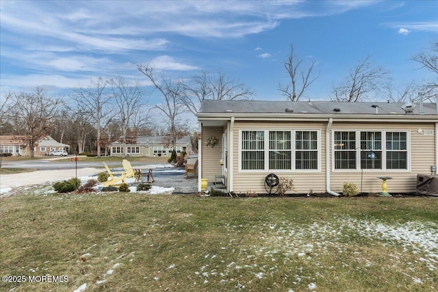 exterior space with a lawn