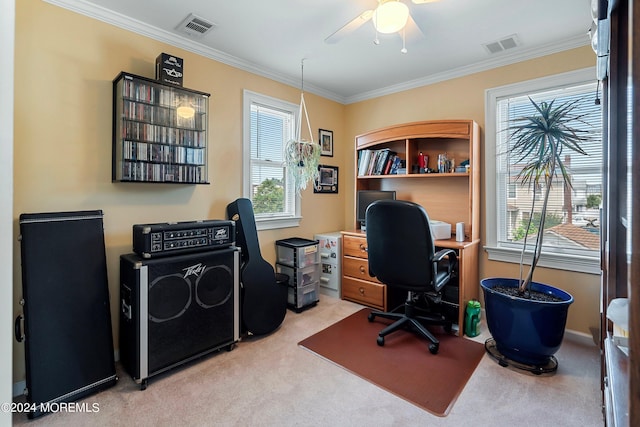 office space featuring crown molding, carpet, a wealth of natural light, and ceiling fan