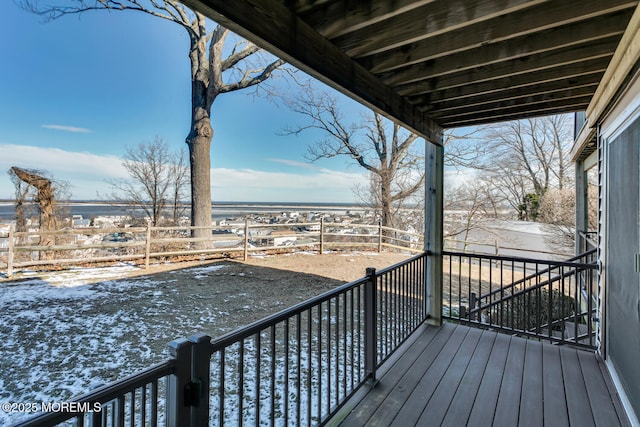 view of snow covered deck