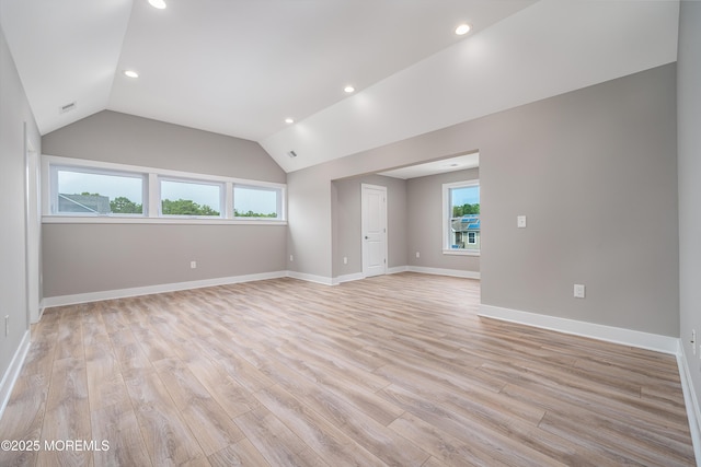 unfurnished room featuring lofted ceiling, recessed lighting, visible vents, baseboards, and light wood finished floors