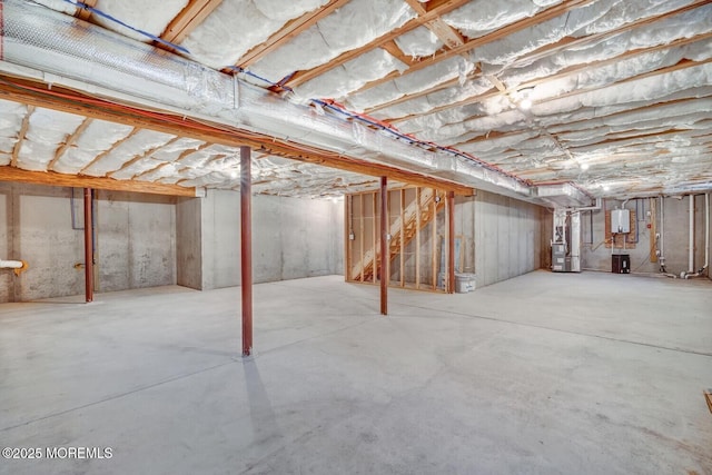 unfinished basement with heating unit