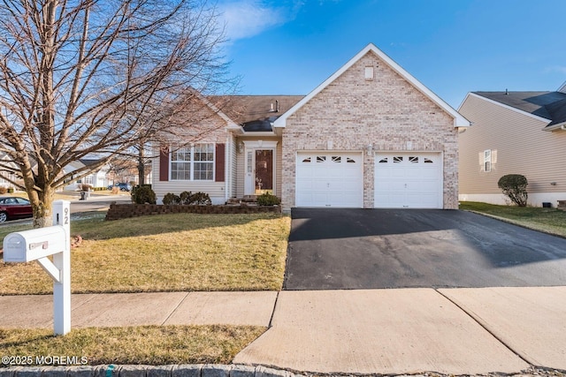 single story home with a garage and a front lawn