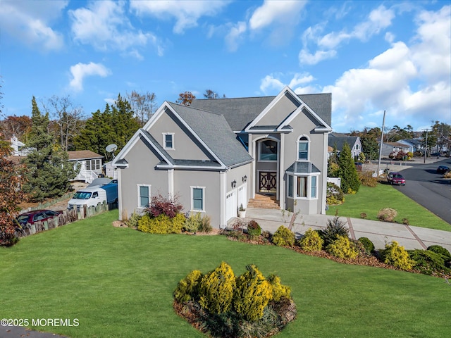 view of front of home featuring a front lawn