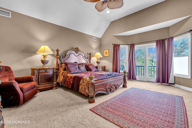 carpeted bedroom with access to outside, vaulted ceiling, and ceiling fan