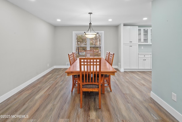 dining area featuring light wood-type flooring