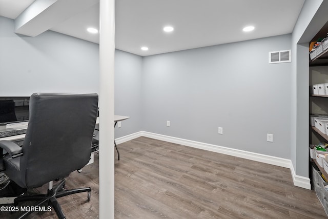 office area with wood-type flooring