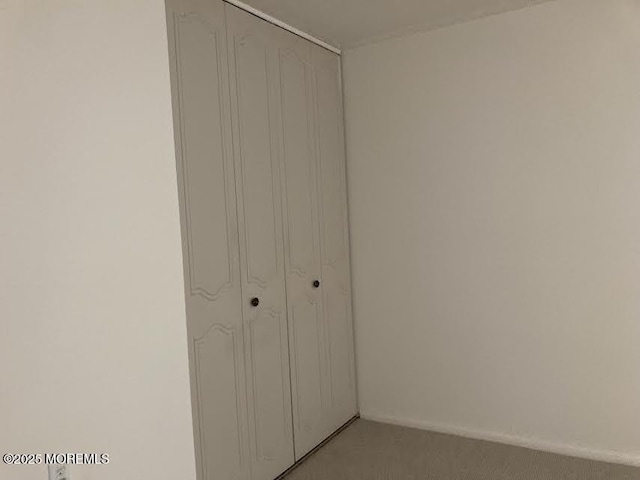 unfurnished bedroom featuring a closet