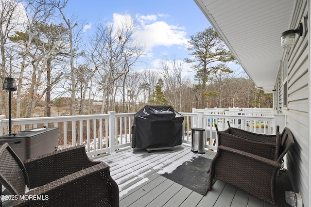 wooden terrace featuring area for grilling