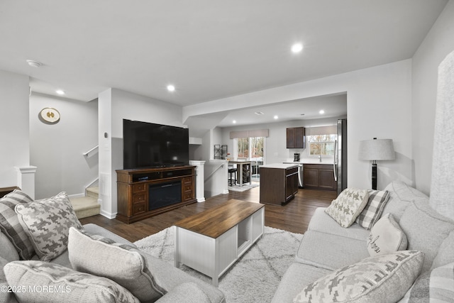 living room with light hardwood / wood-style flooring