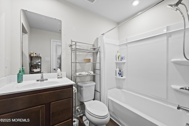 full bathroom featuring vanity, toilet, and shower / bathtub combination with curtain