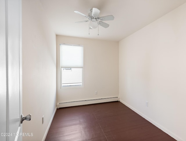 unfurnished room with ceiling fan, dark hardwood / wood-style floors, and baseboard heating