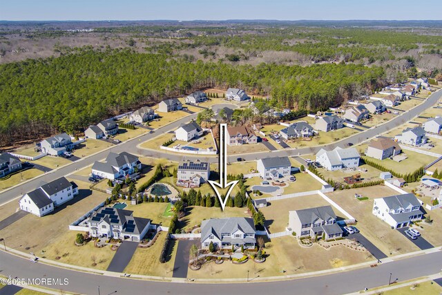 aerial view with a residential view and a forest view